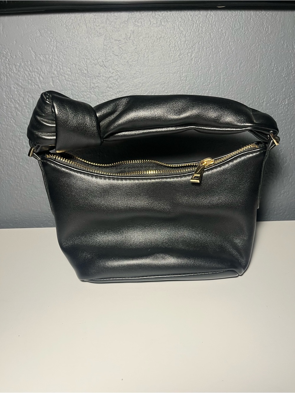 Black Knotted-Handle Shoulder Bag with Gold Hardware